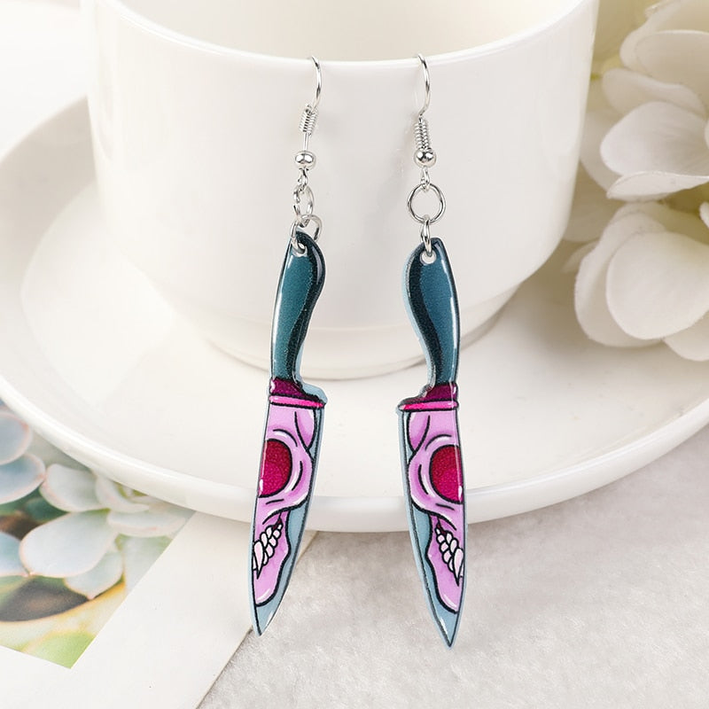 Women’s green hand earrings