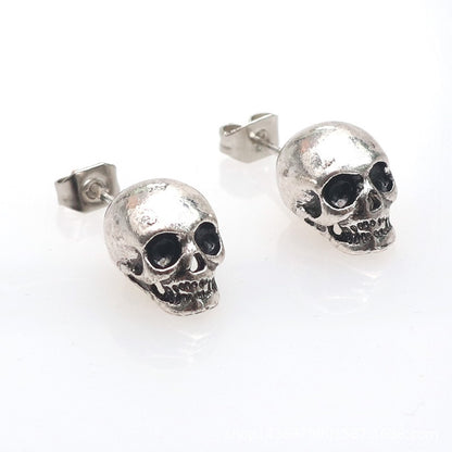 Men’s silver skull stud earrings