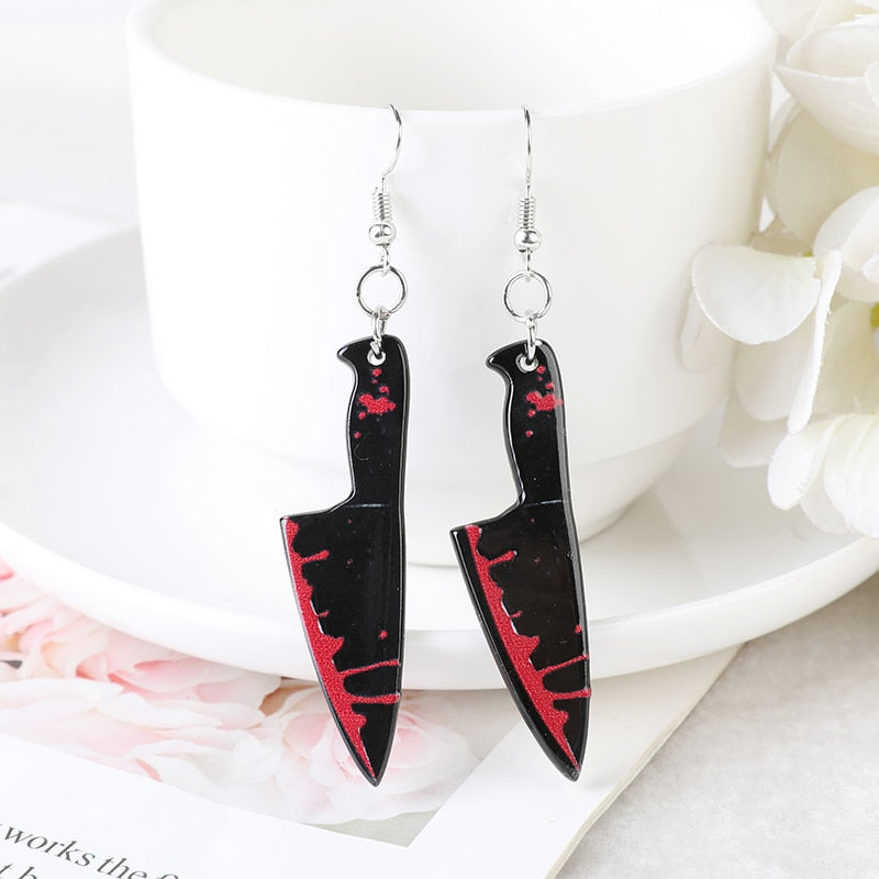 Women’s bloody black knife earrings