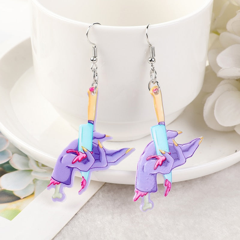 Women’s knife through hand earrings