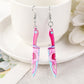 Women’s pink skull knife earrings