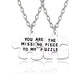 Couple’s matching silver puzzle piece necklace