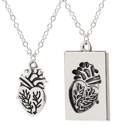 Silver two piece puzzle heart set