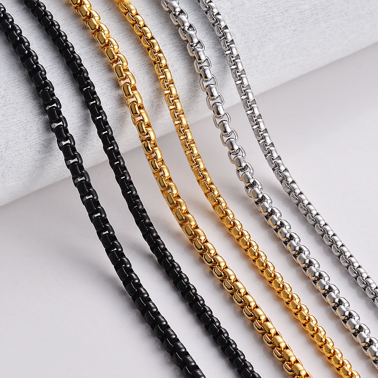 Men’s black, gold and silver box link necklaces 