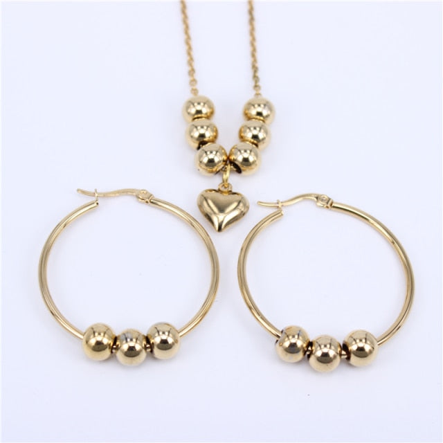 Women’s gold necklace and earrings set