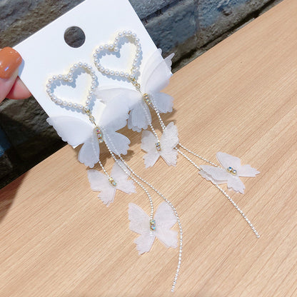 Pearl hearts and white butterfly drop earrings