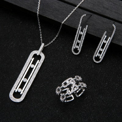 Women’s silver necklace, earrings and rig set