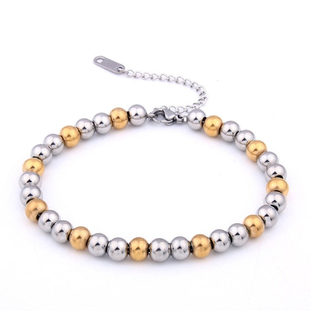 Men’s silver and gold beaded bracelet