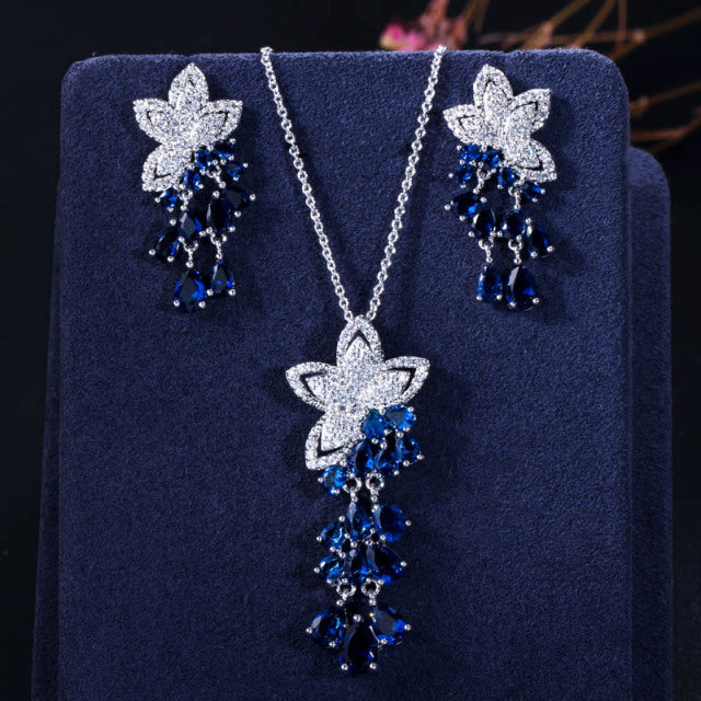 Women’s blue diamond necklace and earrings set