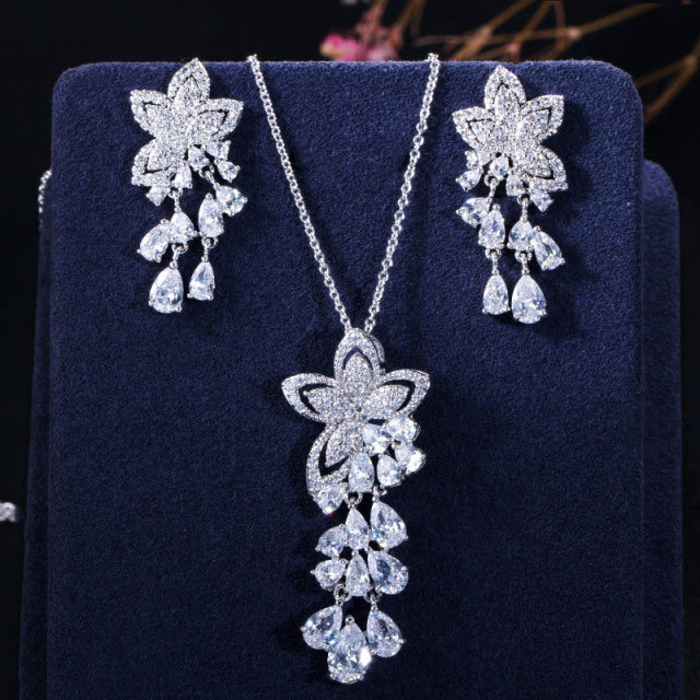 Women’s white diamond earrings and necklace set