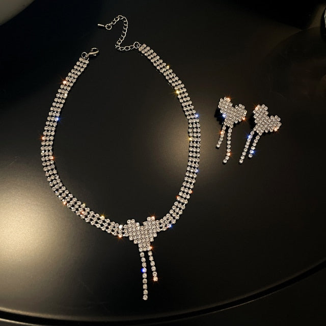 Women’s diamond necklace and earrings set