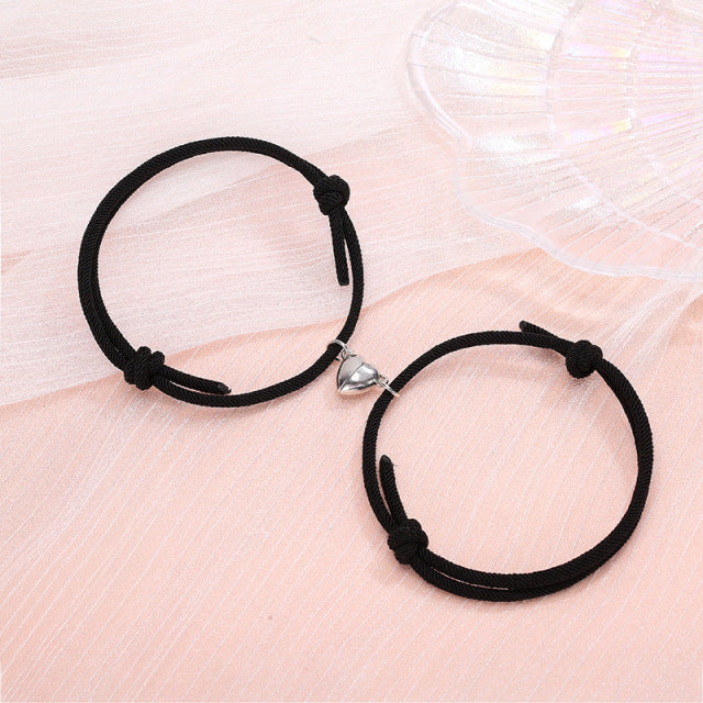 Couple’s matching black heart connecting bracelets