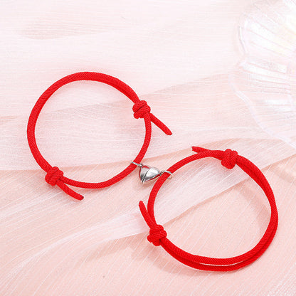 Couple’s matching red heart connecting bracelet set