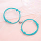 Couple’s matching aqua heart connecting bracelets