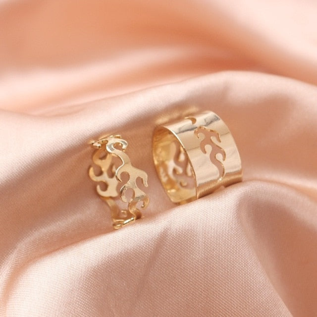 Couple’s matching gold fire ring set