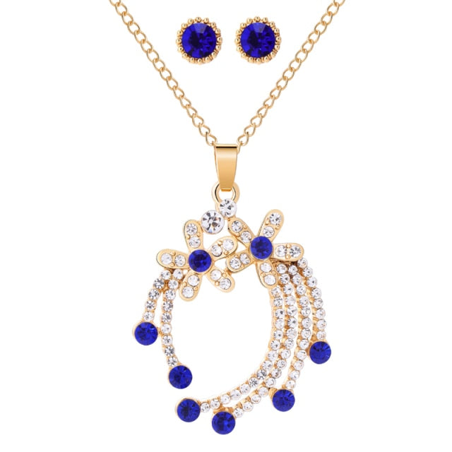 Women’s blue diamond necklace and earrings set