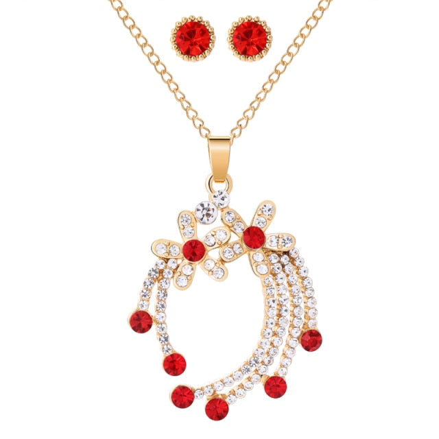 Women’s red diamond necklace and earrings set