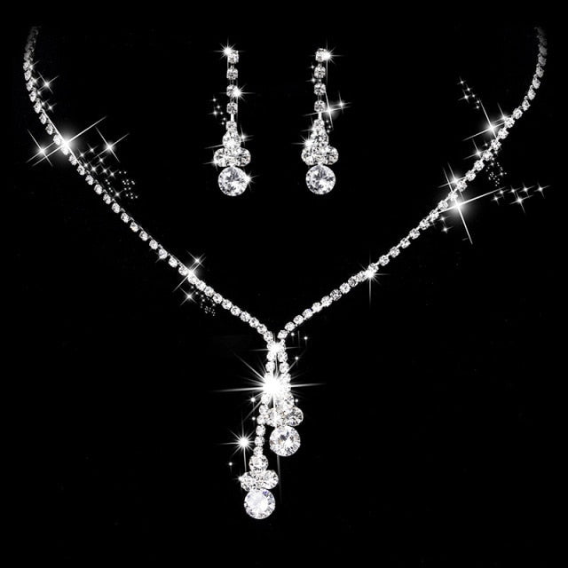 Women’s silver diamond necklace and earrings set 