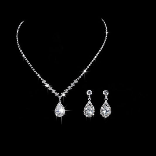 Women’s silver diamond necklace and earrings set