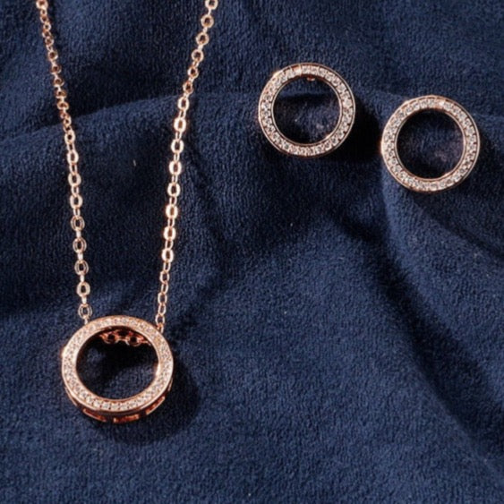 Women’s rose gold and diamonds circle necklace and earrings set