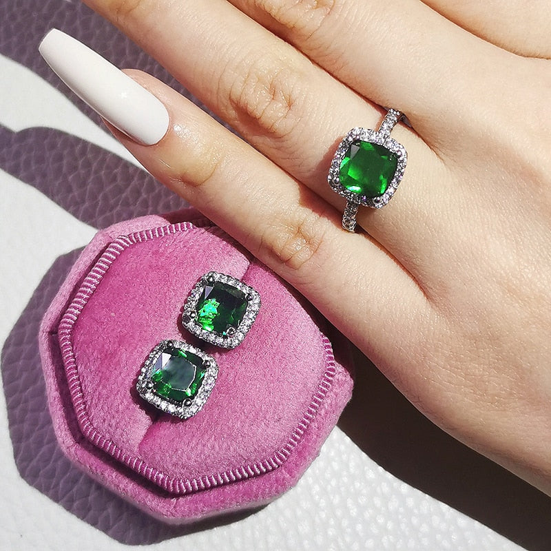 Women’s emerald green ring and earring set