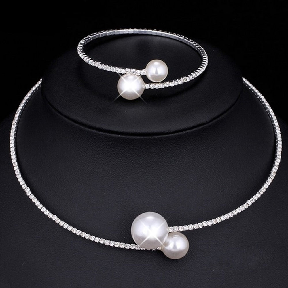 Women’s pearl and diamond cuff necklace and bracelet set